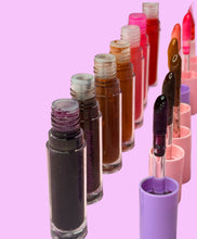 Load image into Gallery viewer, Coming in with the nude pigmented wand tube lip glosses
